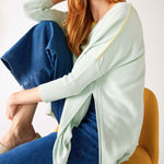 Women's Oversized Crewneck Knit Sweater in Blue Green Contrast Side Slits View