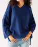 Women's Dark Blue Midweight Loose Fitting V-neck Sweater Front View Hands in Pockets