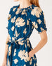 Women's Floral Navy Blue Ruffled Shoulder Midi Dress Side View Bow Waist and Pocket Detail