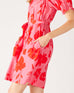 Women's Floral Pink Ruffled Shoulder Midi Dress Side View Close-up Pocket Detail