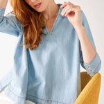 Women's Light Blue Chambray Relaxed Fit Cuffed Sleeves Faux Pearl Snap Detail Popover Top Sitting