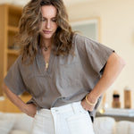 Women's Light Brown Short Sleeve Tee One Size Front View with Jeans