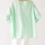 Women's One Size Tee in Light Green Back View Drape