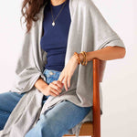 Women's Light Grey Heathered Cashmere Lightweight Travel Wrap Sitting Front View