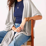 Women's Light Grey Heathered Cashmere Lightweight Travel Wrap Sitting Front View