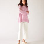 Women's Light Pink Midweight Loose Fitting V-neck Sweater Front View Arms Crossed