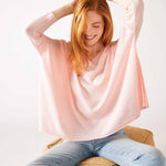 Women's One Size Vneck Knit Sweater in Light Pink Chest View Sitting