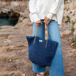 Women's Medium Beach Day Navy Leather Strap Paper Straw Sun Chaser Tote Bag with Chambray Lining and Interior Pockets Travel Destination Look 1