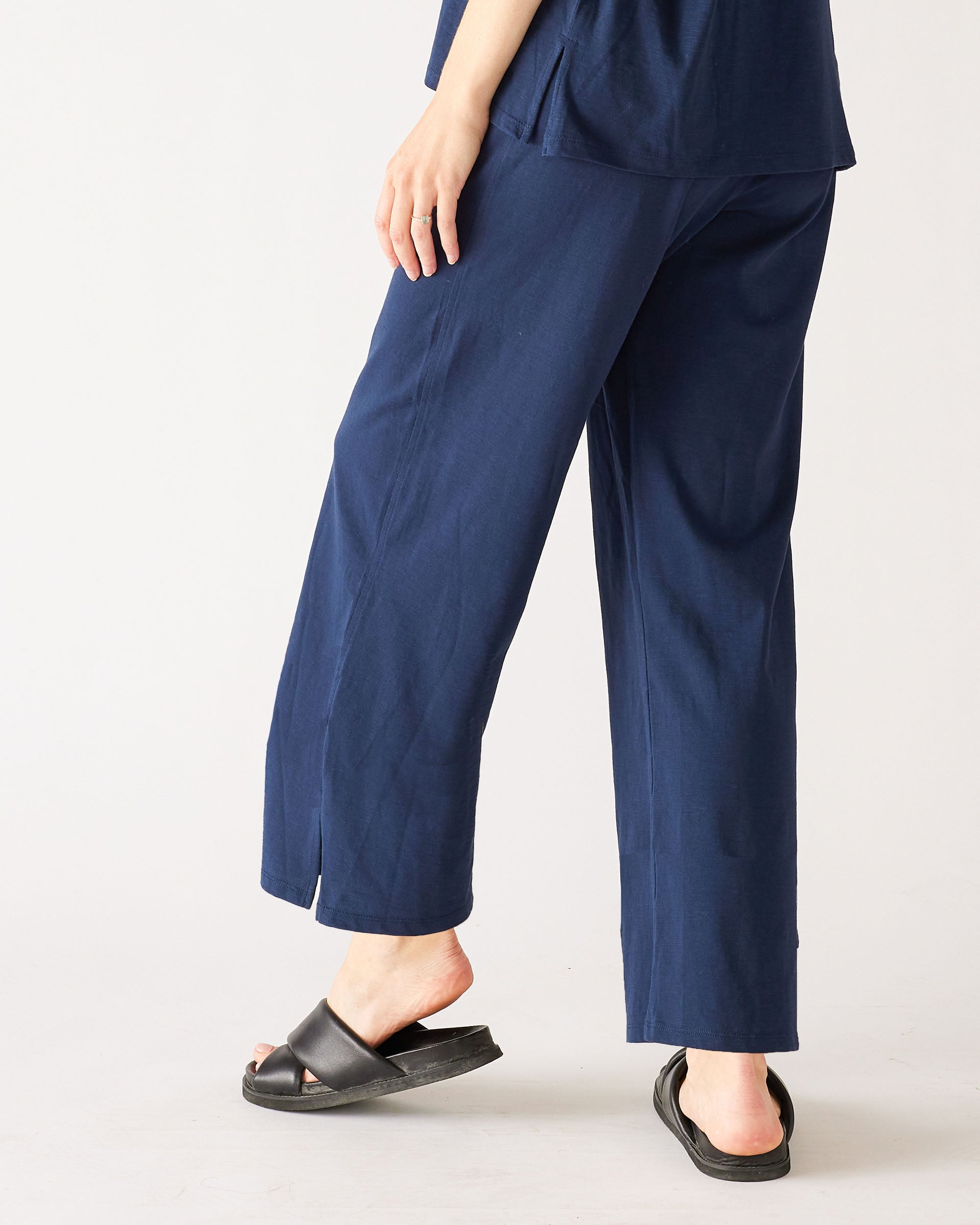 Women's Navy Blue Wide Leg Ankle side Slit Elastic Waist Pant Rear View Walking
