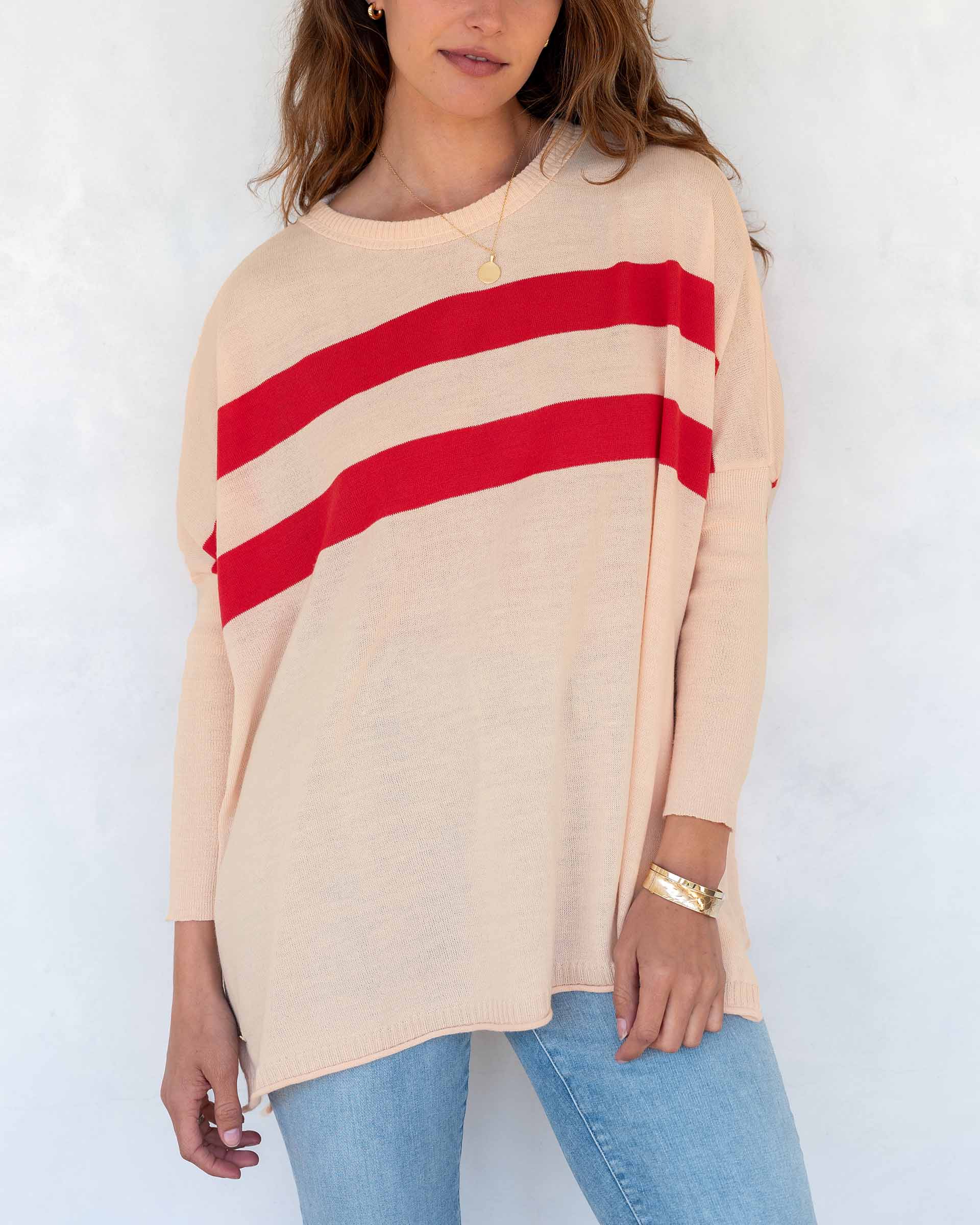 Women wearing a Pink and Red Striped Oversized Crewneck Sweater