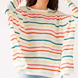 Women's Oversized Crewneck Knit Sweater In Rainbow Stripes Front View With Pockets