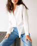 Women's White Breathable Relaxed Fit Button Up Shirt Front View Sitting