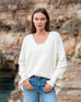 Women's White Everyday High Low Waist Jersey Knit Pullover V-neck Toujour Sweater Front View Travel Destination Look