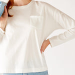 Women's White Front Pocket Pleated Back Crew Neck Long Sleeve Tee Front View Pocket Detail