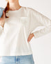 Women's White Front Pocket Pleated Back Crew Neck Long Sleeve Tee Front View Pocket Detail