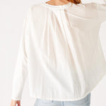 Women's White Front Pocket Pleated Back Crew Neck Long Sleeve Tee Rear View Pleat Detail