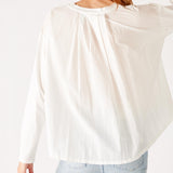 Women's White Front Pocket Pleated Back Crew Neck Long Sleeve Tee Rear View Pleat Detail