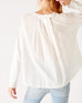 Women's White Front Pocket Pleated Back Crew Neck Long Sleeve Tee Rear View Pleat Detail