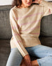 Women's White Heather with Light Pink Striped Lightwieght Crewneck Seasider Sweater Front View Sitting