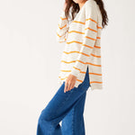 Womens White and Orange Striped Midweight Sweater Standing Side View With Movement