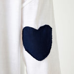 Women's White Oversized Tee with Navy Blue Heart Patch on Elbow