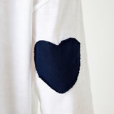 Women's White Oversized Tee with Navy Blue Heart Patch on Elbow