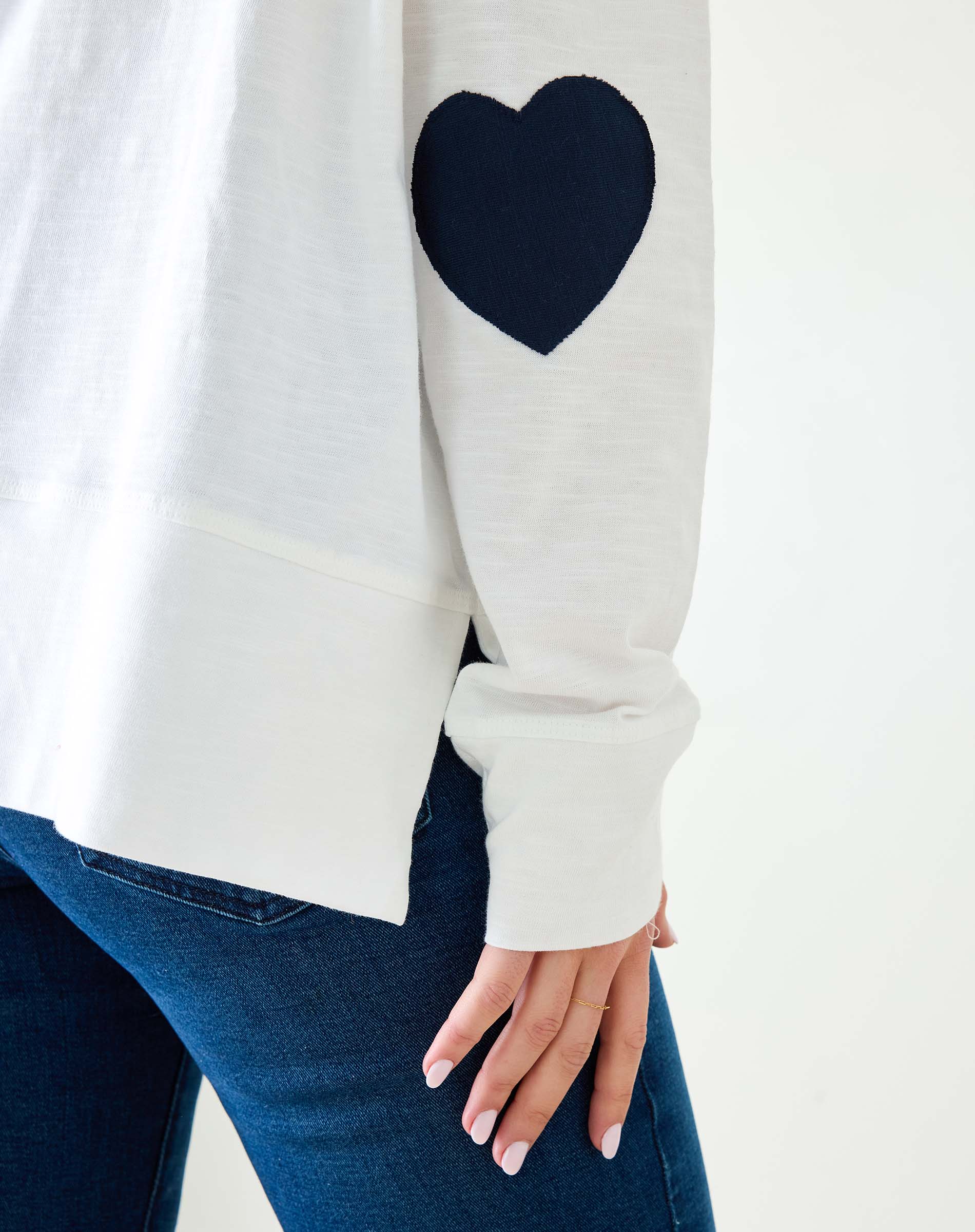 Women's White Oversized Tee with Navy Blue Heart Patch on Elbow