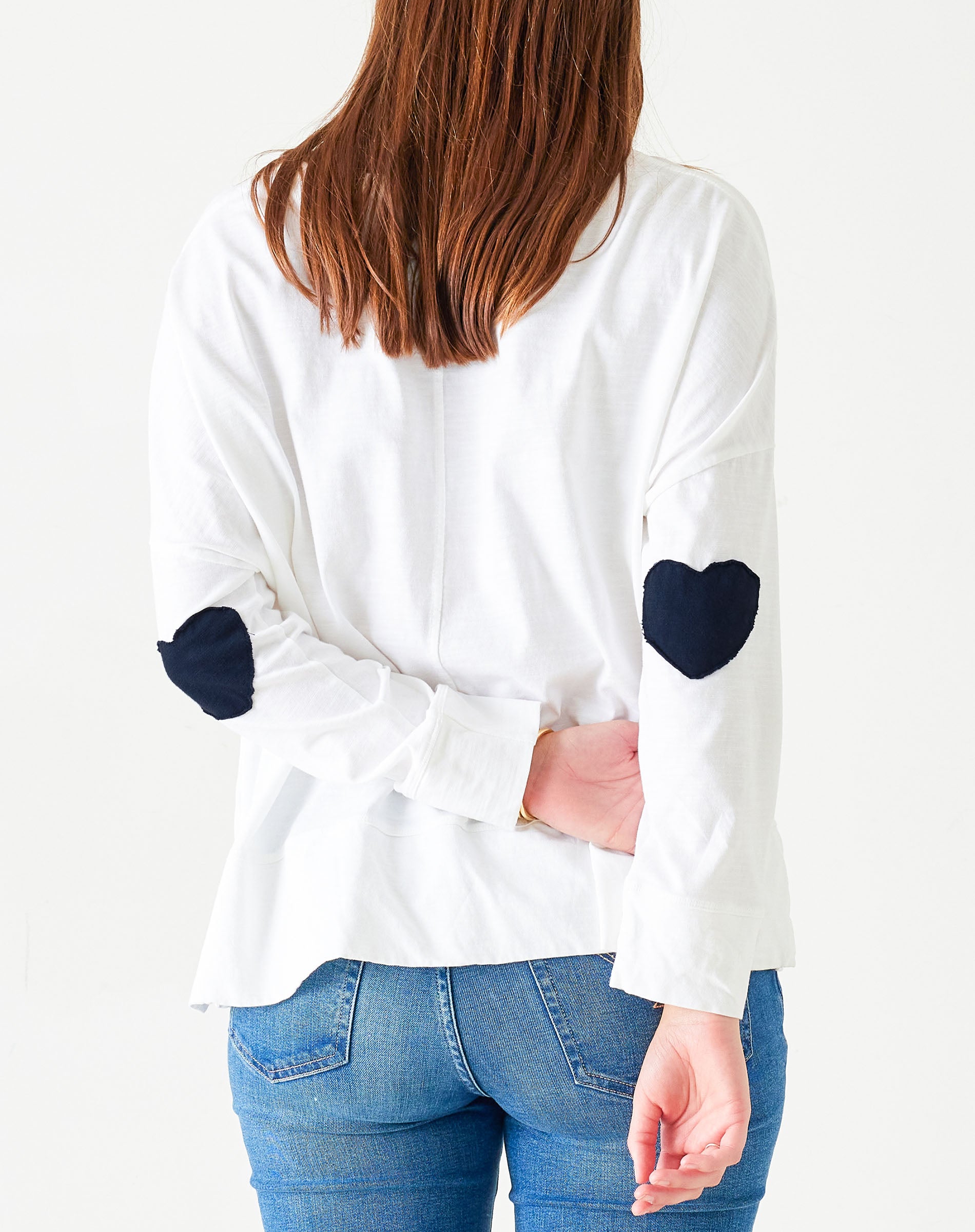 Women's White Oversized Tee with Navy Blue Heart Patch on Elbow