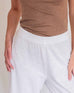 Women's White Wide Leg Ankle side Slit Elastic Waist Pant Front View Close-up Elastic Waist Detail