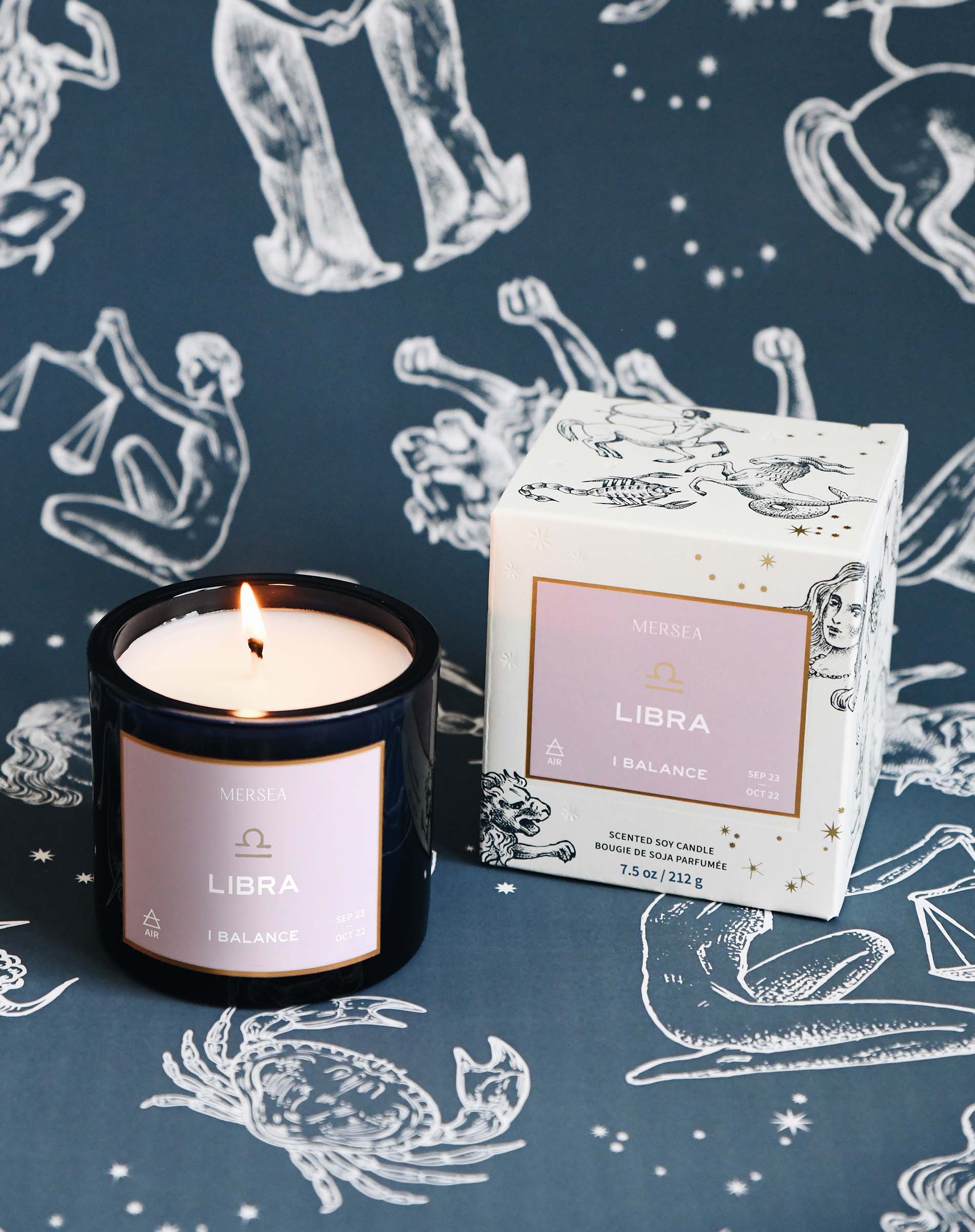 Libra candle and packaging on a zodiac-themed background