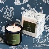 Mersea Virgo candle and packaging on a background with astrological designs
