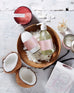 mersea Coconut Sugar Shea Lotion & Hand Soap Set in bowl