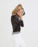 profile of woman wearing mersea Saltwash Sweater in Black
