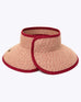 red straw roll-up wide brim hat with opening on top and red trim on a white background