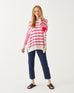 woman wearing Amour Sweater in Pink Stripes and red heart elbow patch