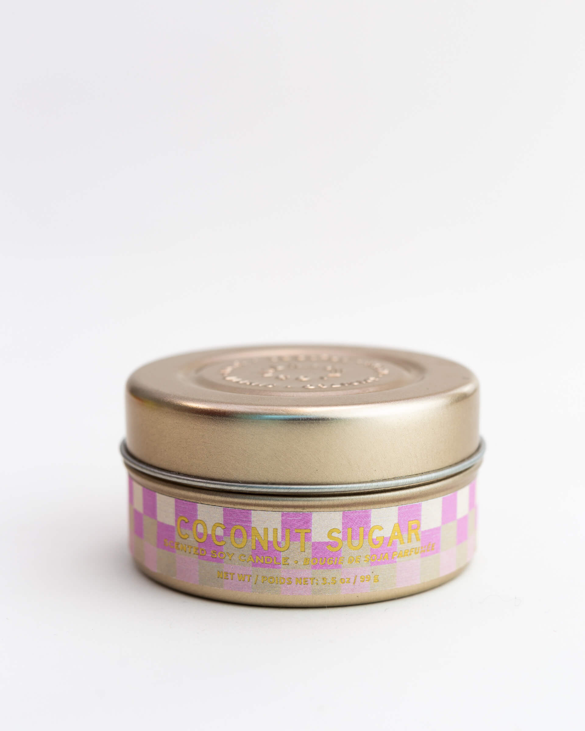 pink and white checkered 3 oz tin coconut sugar candle on a white background