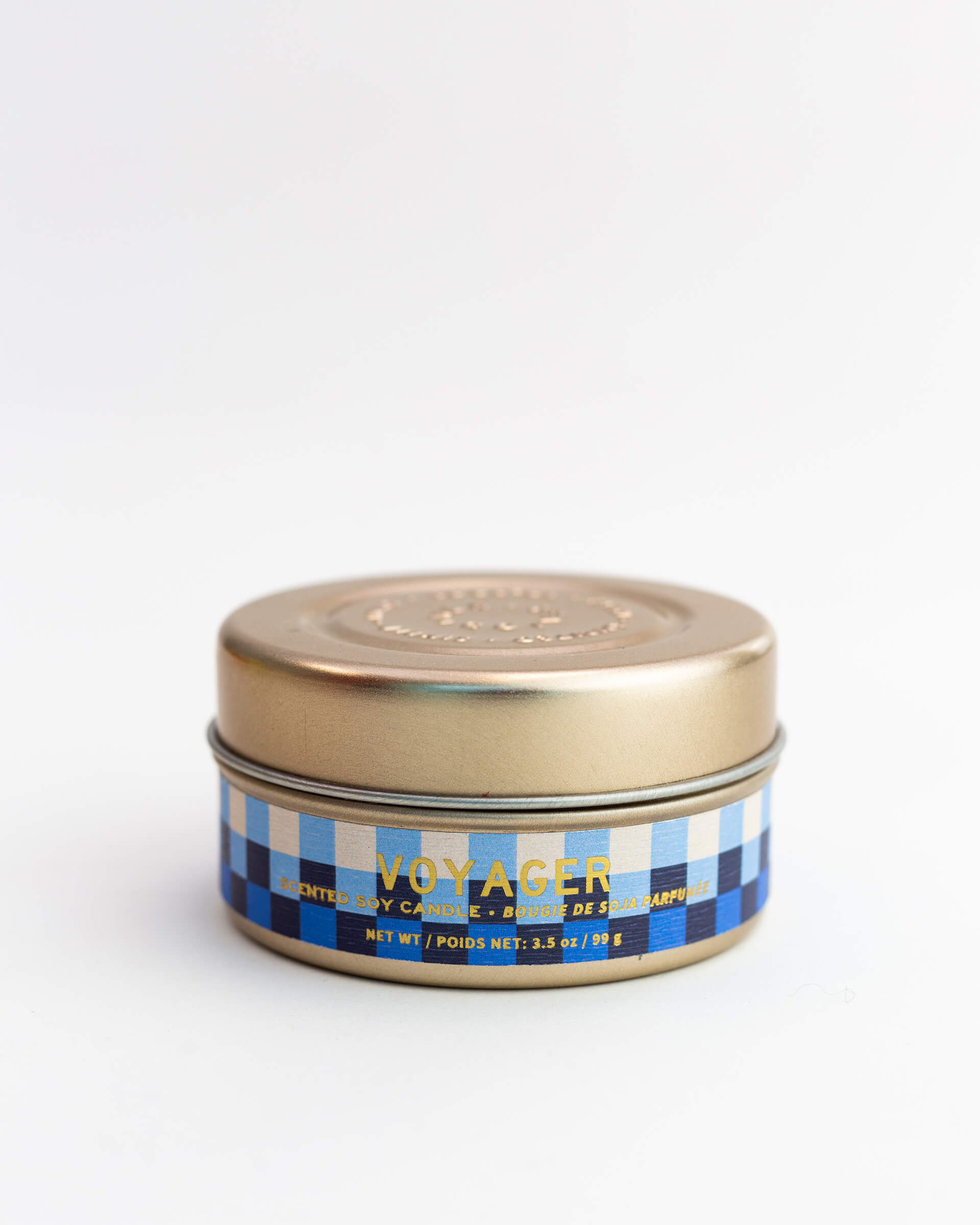 blue and white checkered 3 oz tin voyager candle on a white background