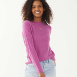 female wearing purple fitted cashmere sweater with a crewneck on a white background