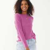 female wearing purple fitted cashmere sweater with a crewneck on a white background