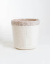 medium sized white with grey trim hand felted planter on a white background 