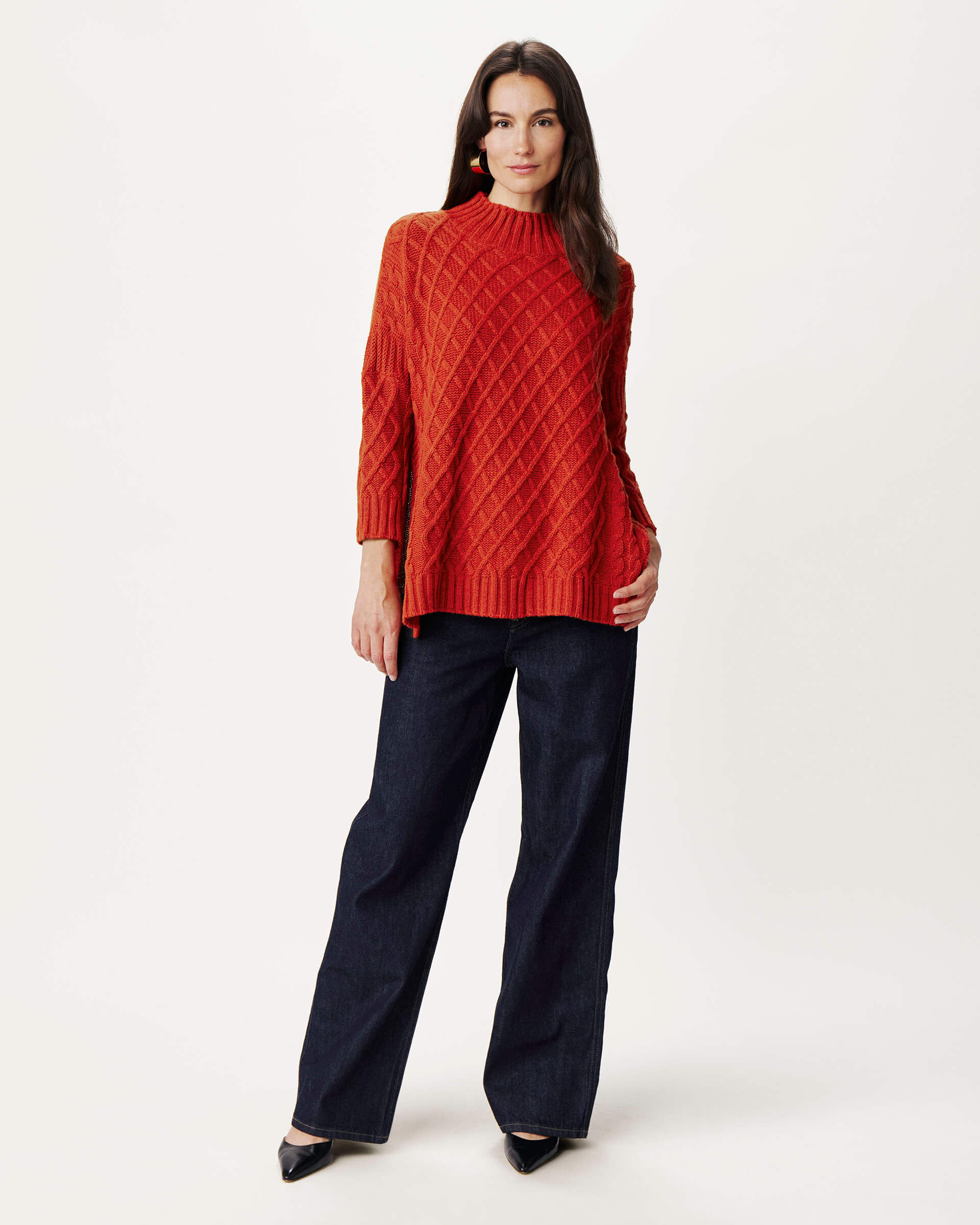 woman wearing Mersea lisbon red sweater