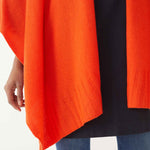 Close up pattern detail bright orange wrap
