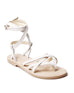 white leather strappy gladiator sandal at an angle on a white background