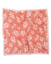 pink scarf with light pink vine pattern on a white background