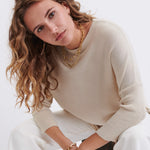 Women's Oversized Crewneck Knit Sweater in Light Brown Chest View Sitting