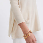 Women's Oversized Crewneck Knit Sweater in Light Brown Side View with Pockets