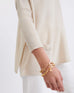 Women's Oversized Crewneck Knit Sweater in Light Brown Side View with Pockets