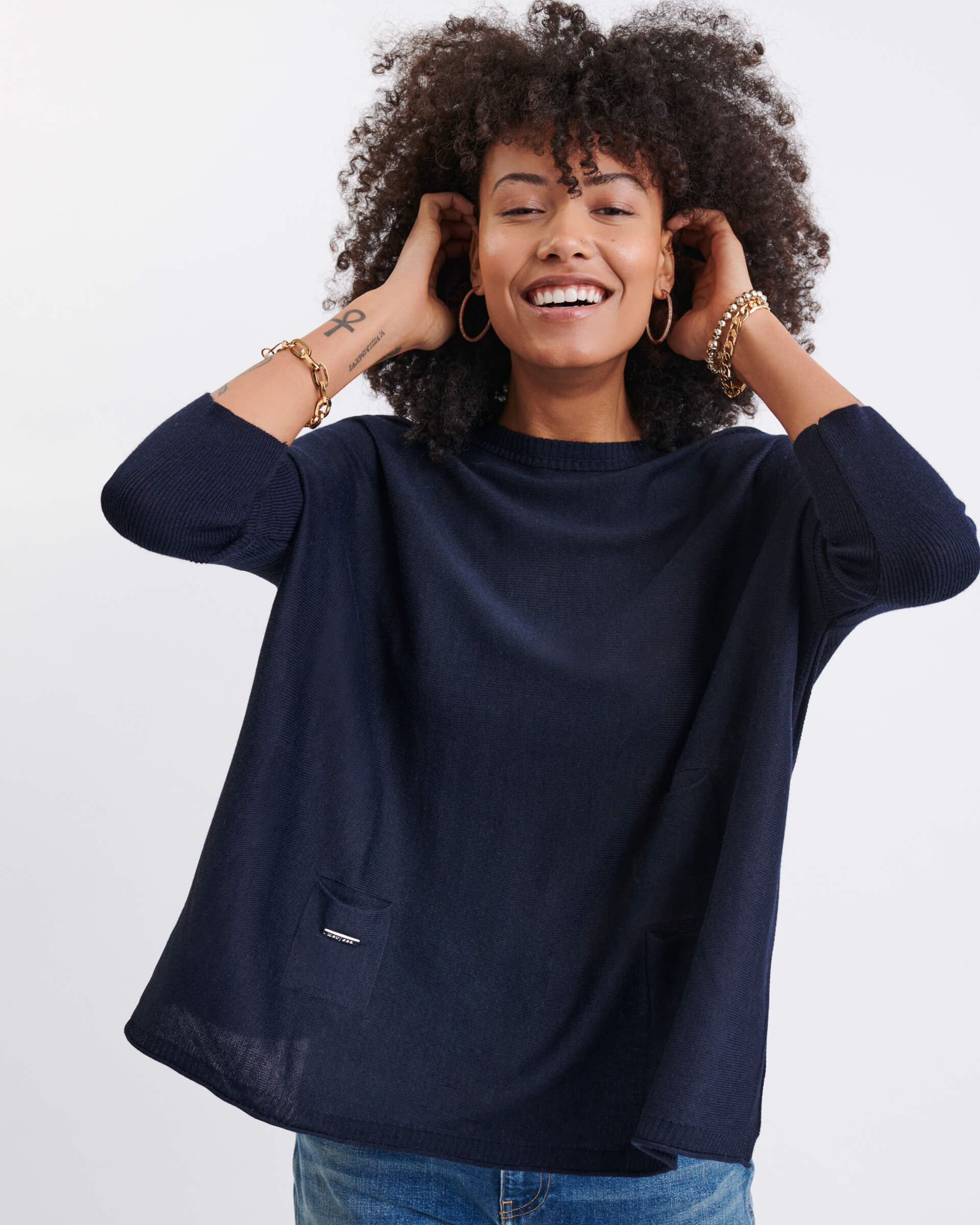 Women's Oversized Crewneck Knit Sweater in Navy Chest View Drape of Fabric